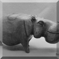 D57b. Carved wood hippo. 5”h - $20